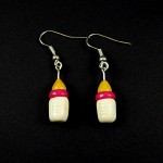 Boucles d'oreilles biberons fuchsia