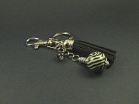 Bijou de sac et porte-clé avec une perle artisanale zèbre