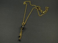 Collier fantaisie couleur bronze avec des perles facettées noires