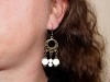 Boucles d'oreilles couleur bronze avec des perles magiques