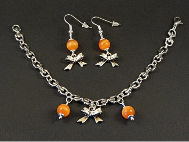 Ensemble boucles d'oreilles et bracelet fantaisie perles et noeuds