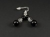 Boucles d'oreilles fantaisie perles lisses noires et perles facettées translucides
