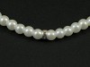 Bracelet fantaisie perles nacrées et rondelles strassées
