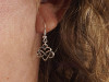 Boucle d'oreille breloque coeur et signe infini entrelacés