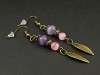 Boucles d'oreilles perles et breloques couleur bronze