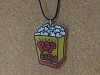 Collier artisanal en plastique fou motif carton de popcorn