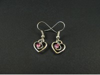 Boucles d'oreilles coeurs avec des strass roses