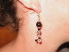 Boucle oreille fantaisie avec perles de verre noires et transparentes