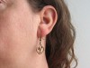Boucles d'oreilles fantaisie coeurs entrelacés bronze
