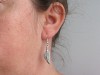 Boucles d'oreilles fantaisie en métal plume triangulaire