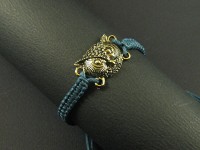Bracelet tissage shamballa avec une tête de chouette