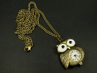 Collier bronze avec un pendentif montre chouette