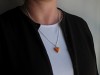 Collier au pendentif part de tarte à l'orange