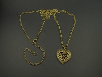 Collier transformable en collier sautoir avec un pendentif coeur filigrané bronze