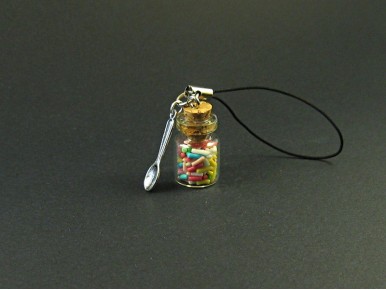 Bijou de téléphone mini bocal de verre rempli de bonbons vermicelles